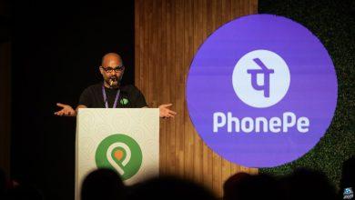 Sameer Nigam at podium with PhonePe logo shown