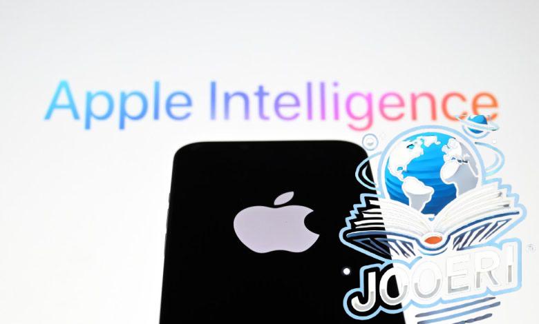 In this photo illustration, the 'Apple' logo is displayed on a mobile phone screen in front of a computer screen displaying Apple Intelligence logo.